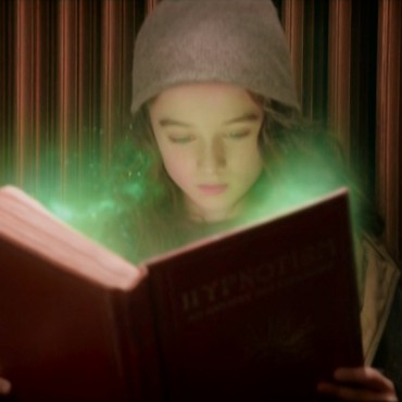Video Effects - green dust from rises from the book - still from the movie