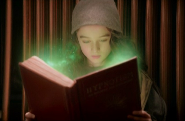 Video Effects - green dust from rises from the book - still from the movie